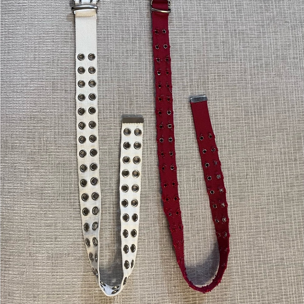 Stylish White and Red Grommet Belts